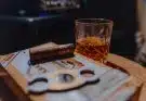 clear drinking glass on brown wooden table