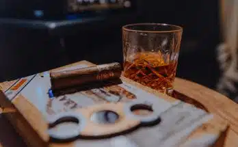 clear drinking glass on brown wooden table